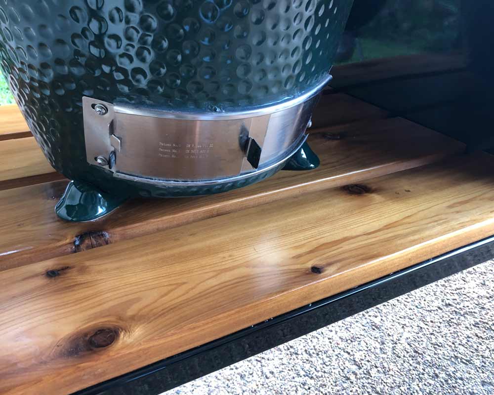 Big Green Egg table details of cedar and steel.
